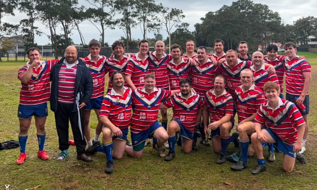 A rugby team photo after a semi-final match